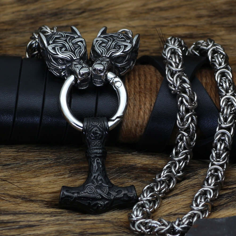 Braided King Chain With Twin Wolf Heads Holding A  Mjolnir Pendant