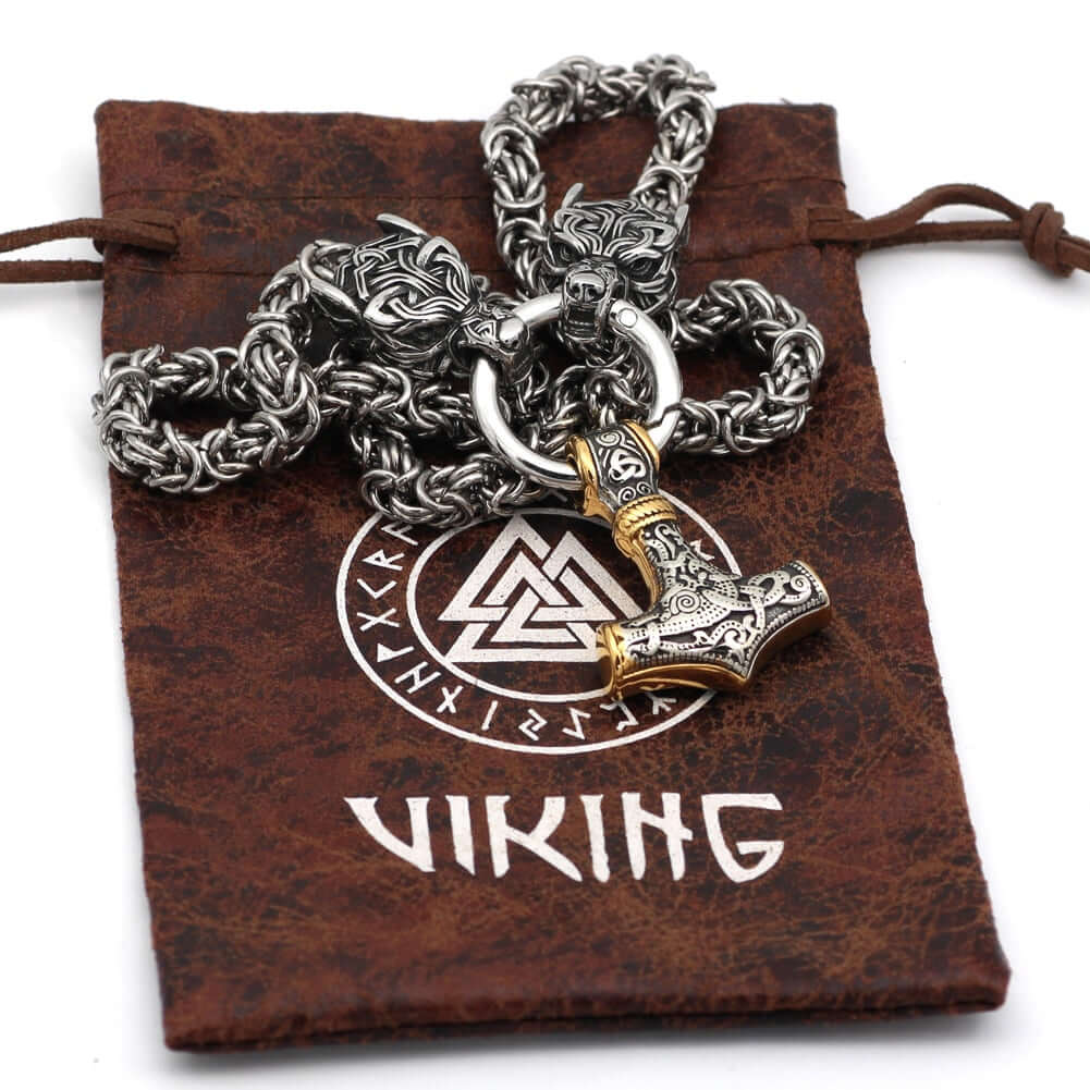 Braided King Chain With Twin Wolf Heads Holding A  Mjolnir Pendant