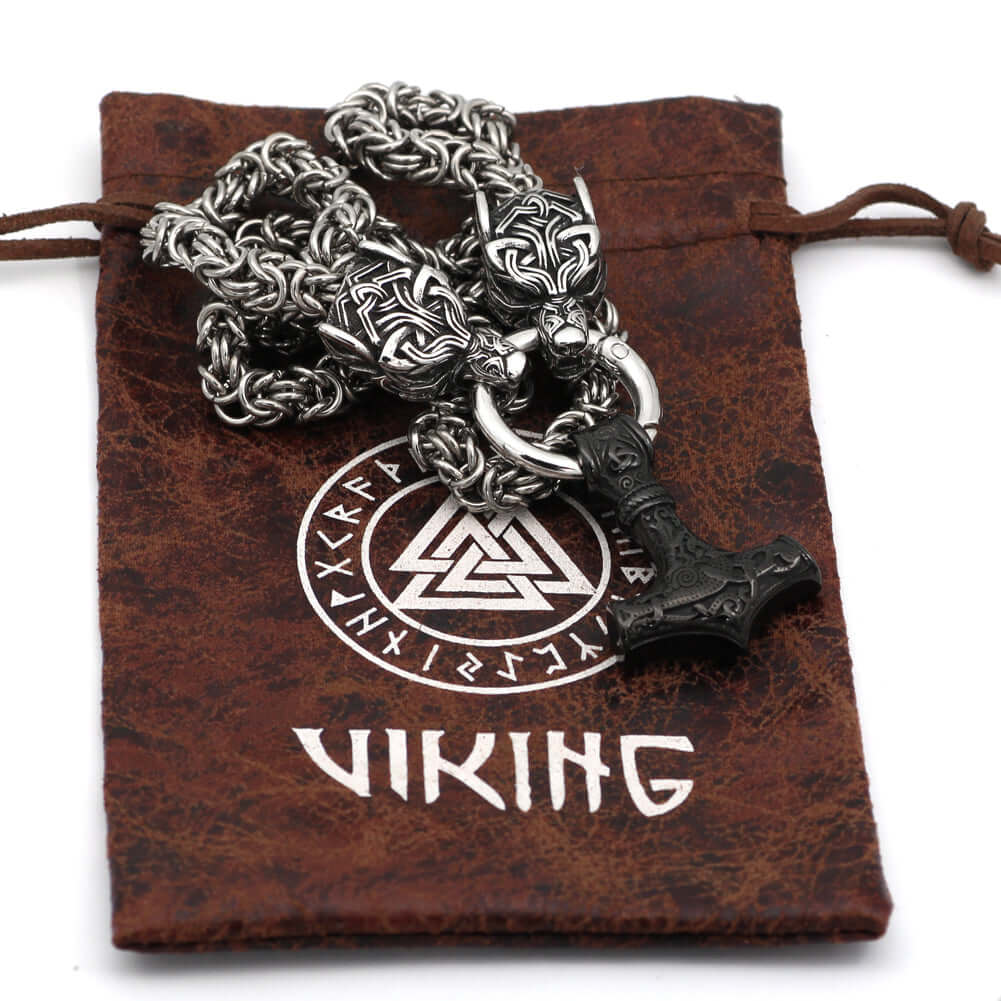 Braided King Chain With Twin Wolf Heads Holding A  Mjolnir Pendant