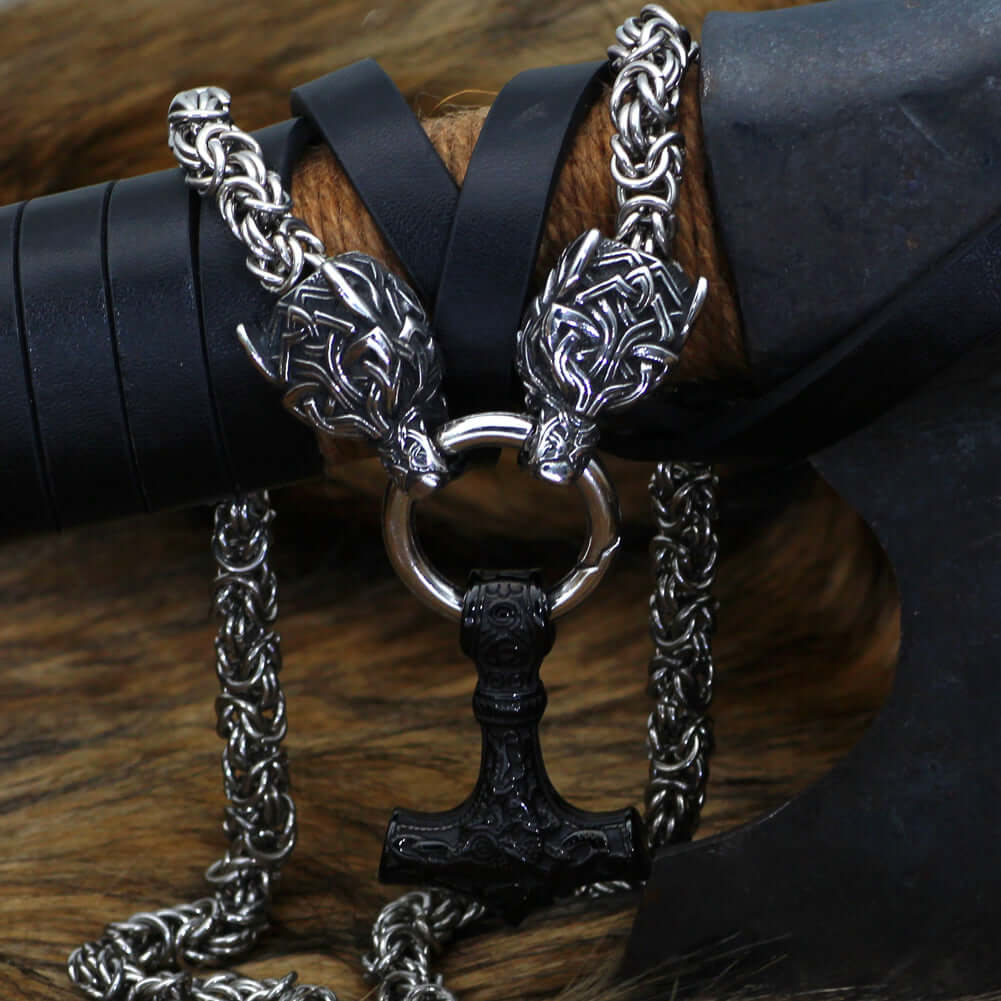 Braided King Chain With Twin Wolf Heads Holding A  Mjolnir Pendant